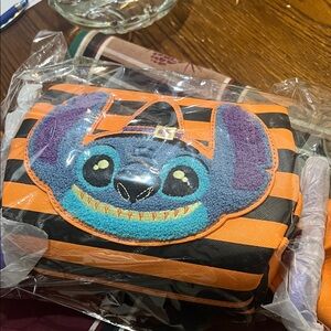 Loungefly Orange and Black Lilo and stitch candy wrapper bag